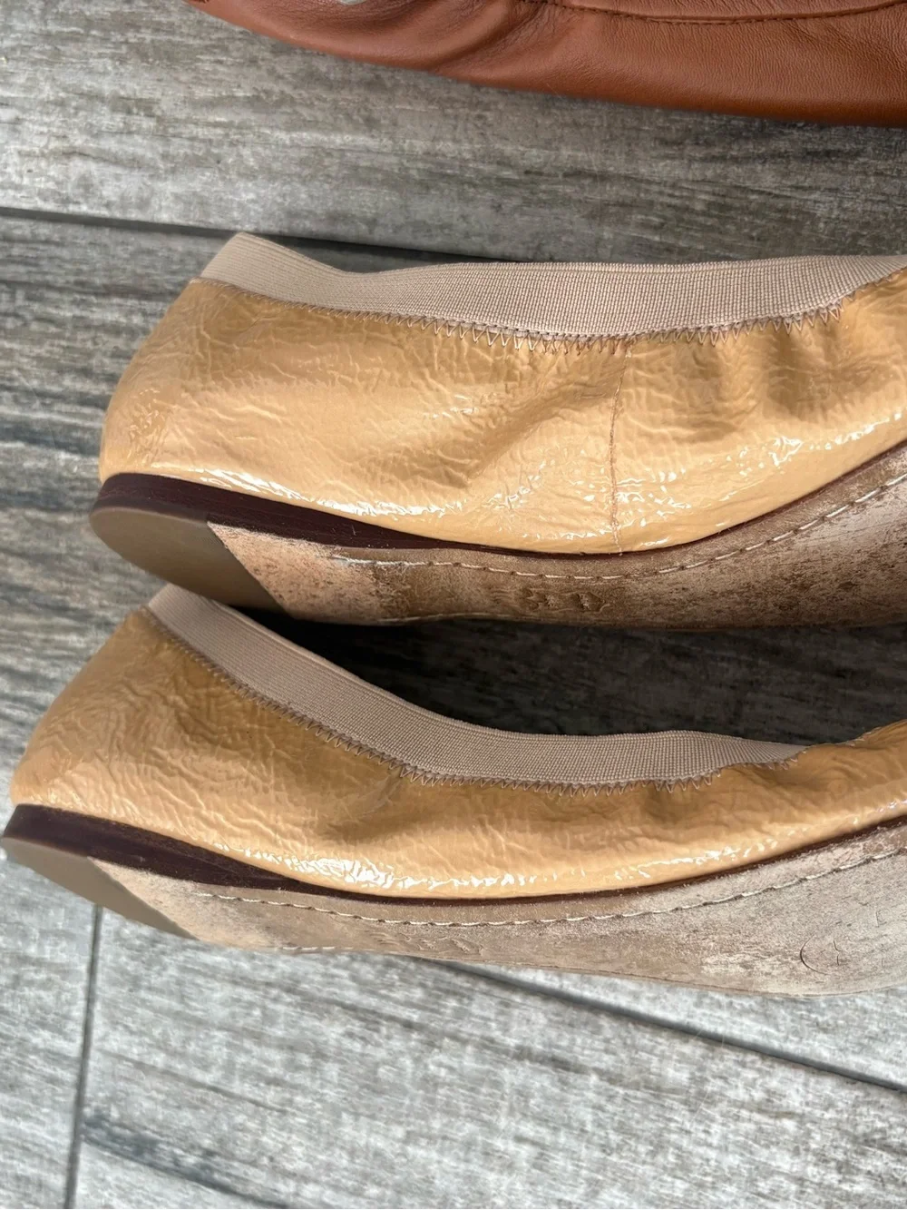 Tory Burch Tan Patent Leather Flats with Gold Logo Medallion